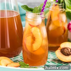 Sun-Kissed Peach Tea 9 Homemade peach iced tea with fresh peach slices