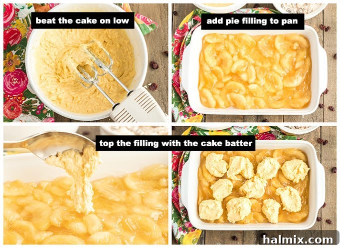 Dollops of moist cake batter are carefully added over the warm apple cranberry pie filling in a baking pan, creating the base layer for the topping.