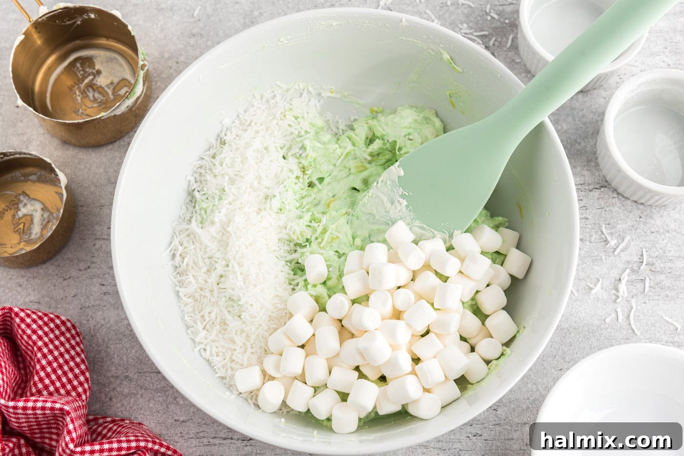 Emerald Cloud Dessert 7 mini marshmallows and flaked coconut added to pistachio pudding