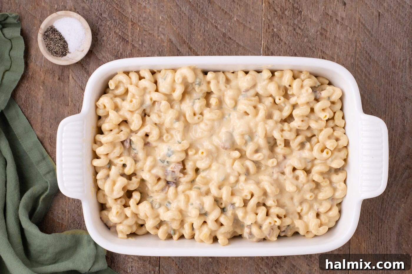 Kicking Cheesy Jalapeño Mac 12 jalapeno popper mac and cheese in a baking dish