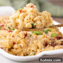 Close up photo of a spoonful of Jalapeno Popper Mac and Cheese