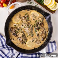 Skillet of Veal Scallopini, a close-up overhead shot.
