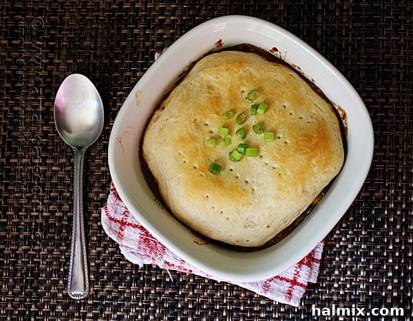 Beef stew meat dredged in flour and seasoning, ready for browning