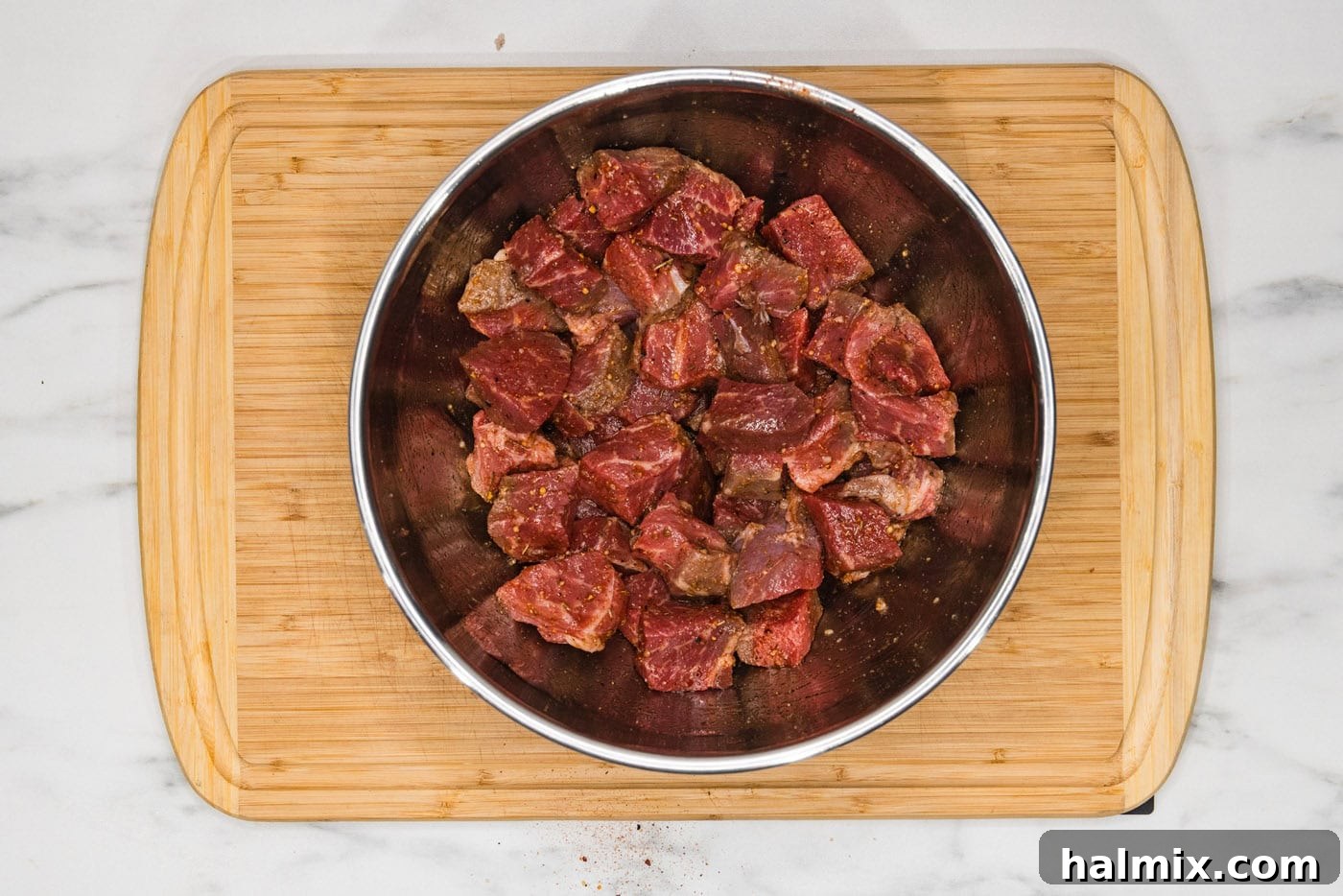seasoned cubed steak in a bowl