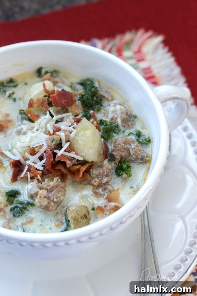 close up photo bowl of zuppa toscana soup