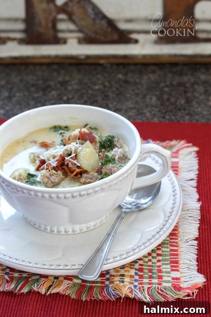 bowl of zuppa toscana on red placemat