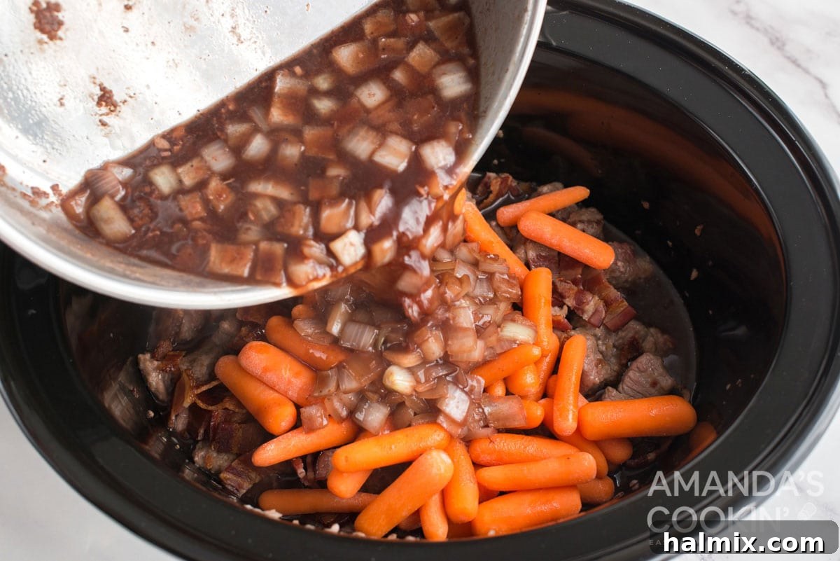 adding wine mixture to crockpot