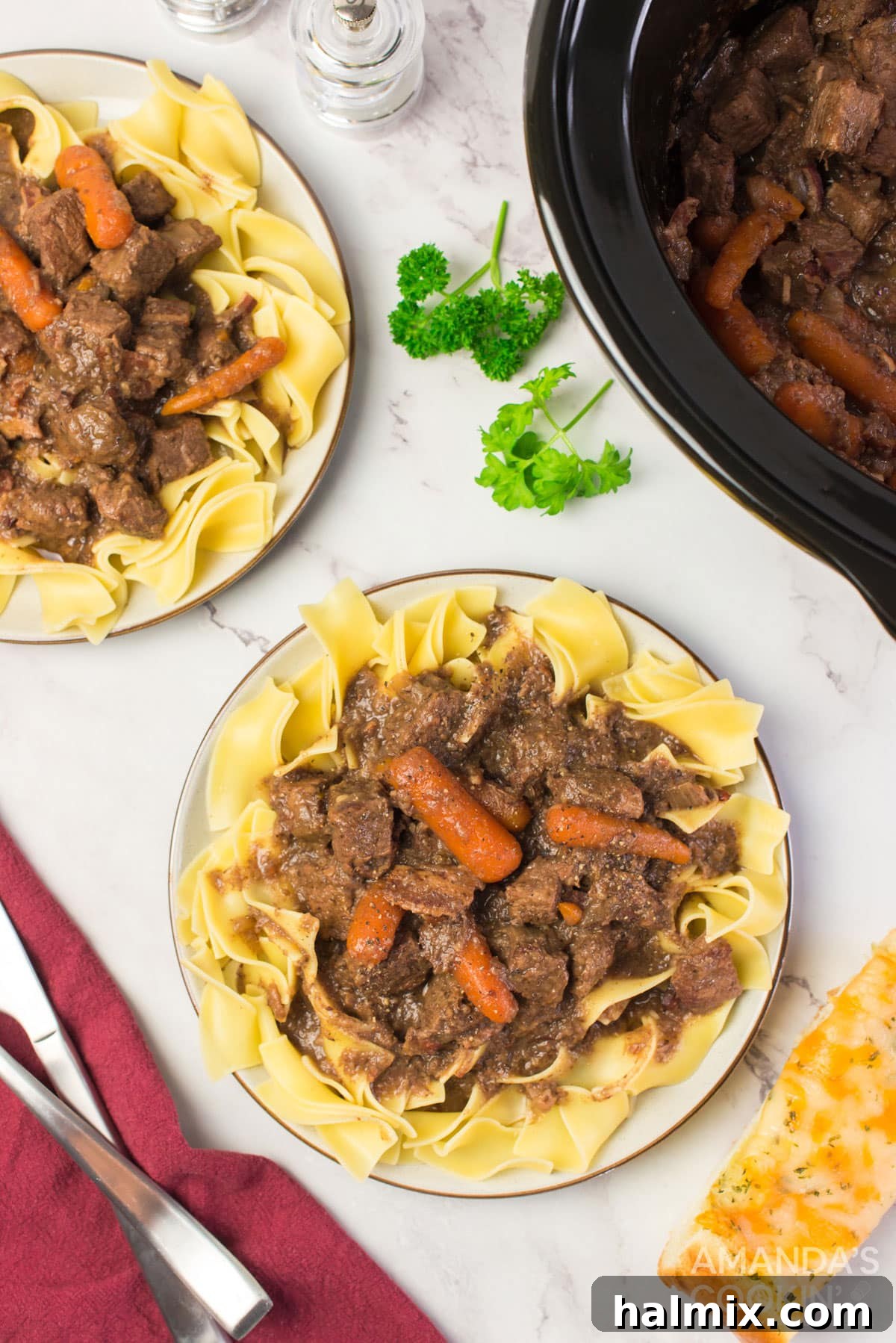 two plates of beef burgundy