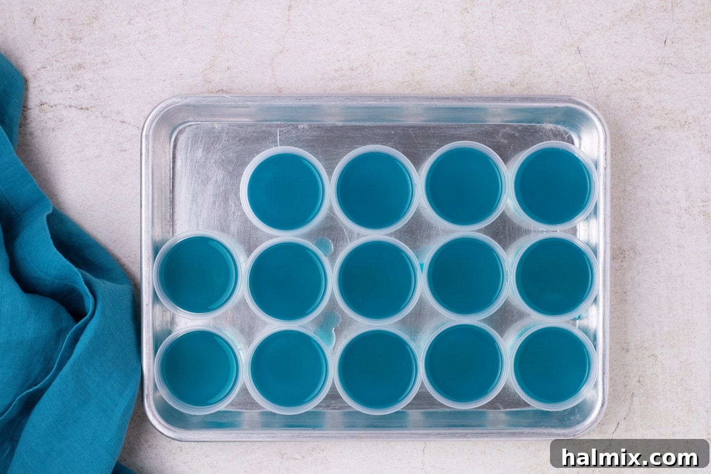 shot glasses filled with blue jello