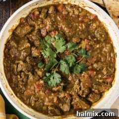 Close up photo of a skillet of Beef Curry, showcasing its rich texture