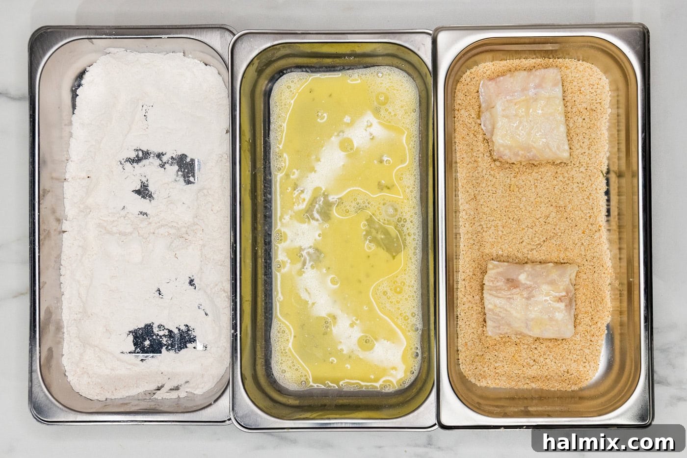 dredged cod fillets in panko breadcrumb mixture