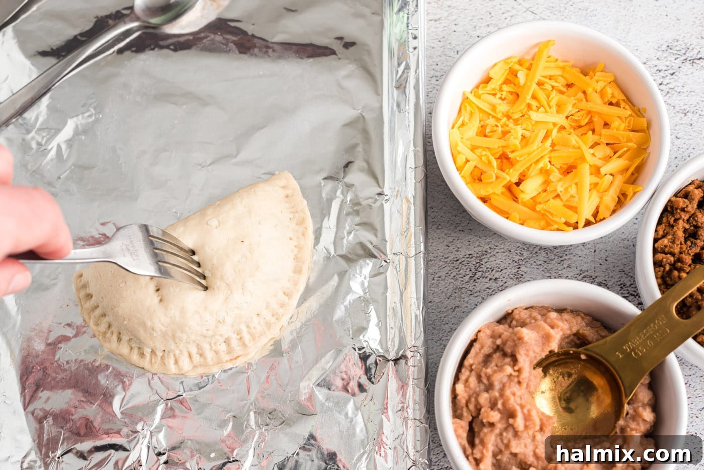 Fiesta Taco Pockets 11 poking holes on the top of empanadas