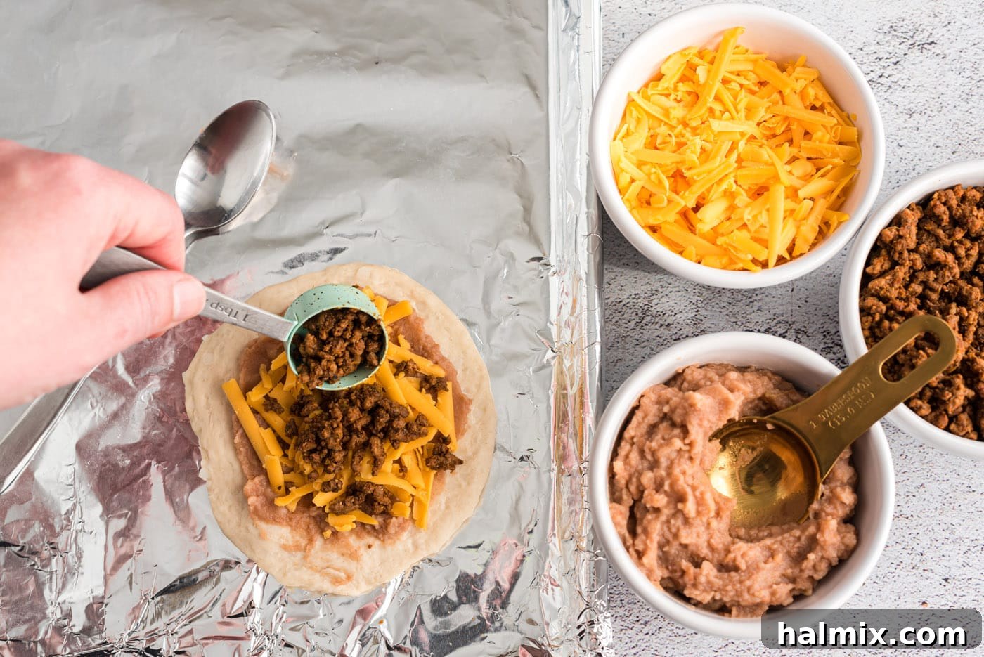 Fiesta Taco Pockets 8 adding taco meat to empanadas