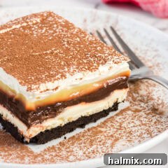 Pure Bliss Pan Dessert 15 Close up photo of a slice of Sex in a Pan on a plate