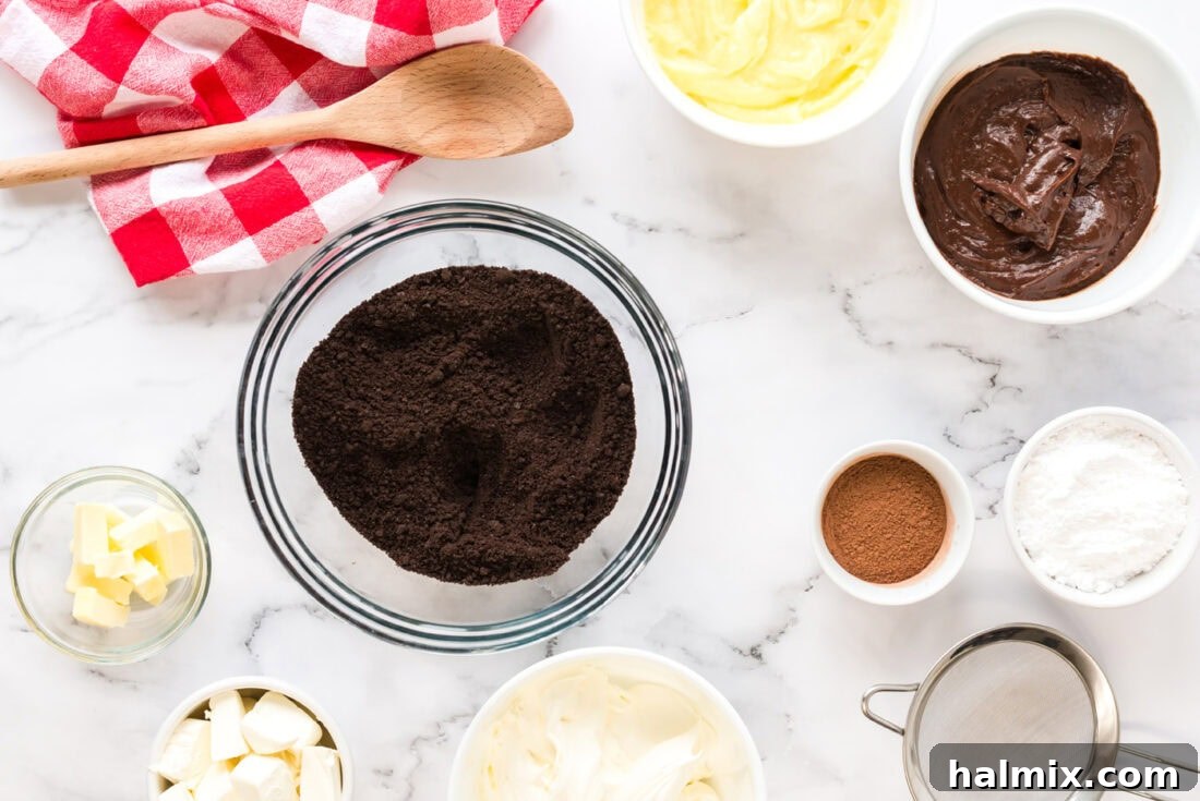 Pure Bliss Pan Dessert 4 A flat lay photograph displaying all the ingredients needed to make Sex in a Pan, including packets of pudding mix, cream cheese, butter, and graham cracker crumbs.