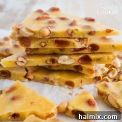 Stack of golden homemade peanut brittle pieces