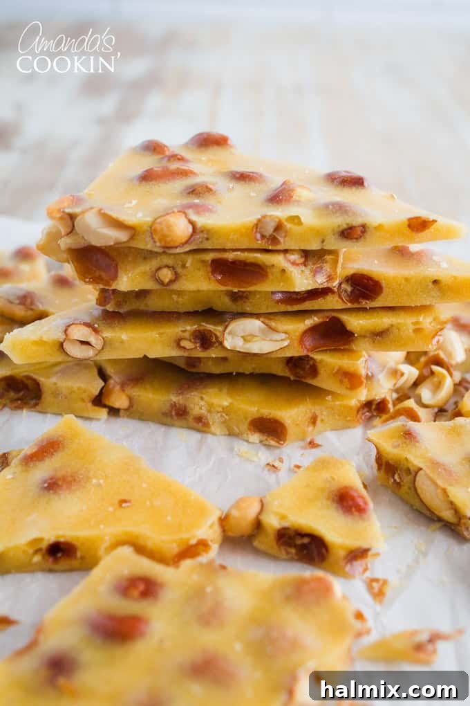 Cut up pieces of delicious homemade peanut brittle ready to be enjoyed