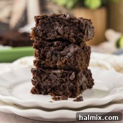 Hidden Veggie Fudge Brownies 14 Close up photo of a stack of Zucchini Brownies