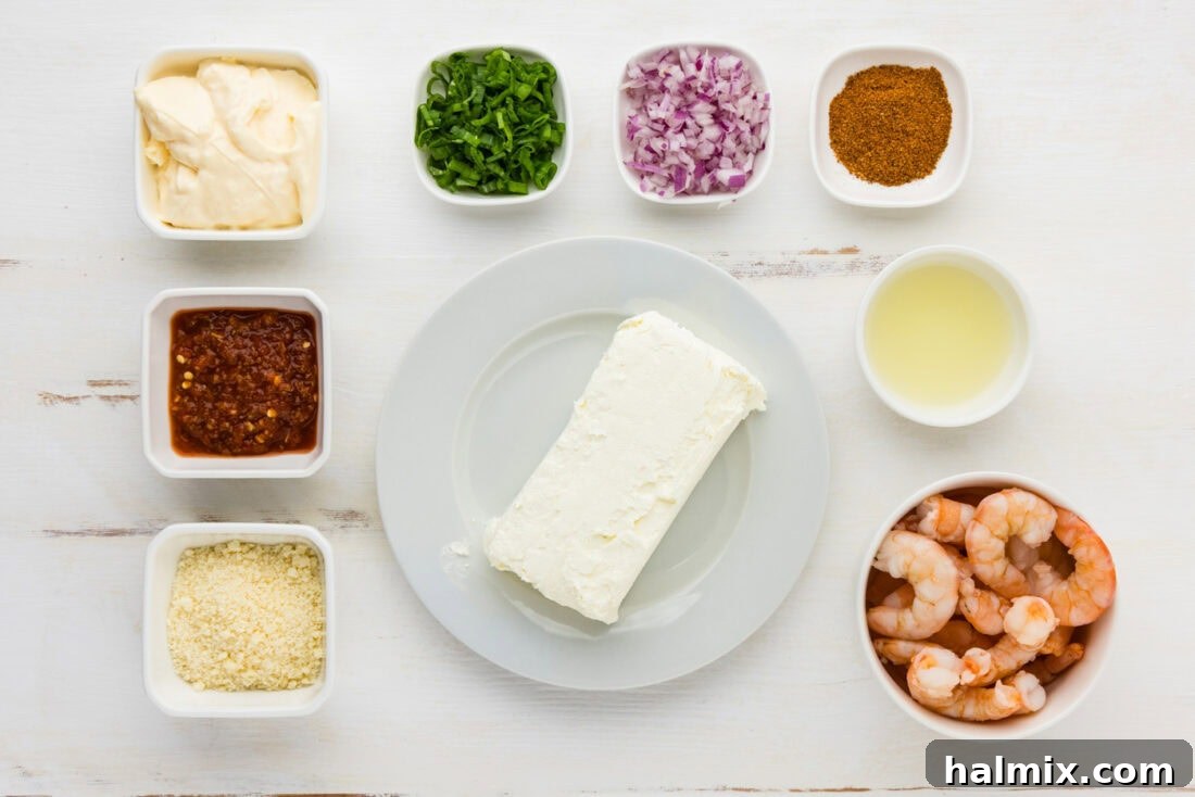 A selection of fresh ingredients laid out, ready for making shrimp dip.