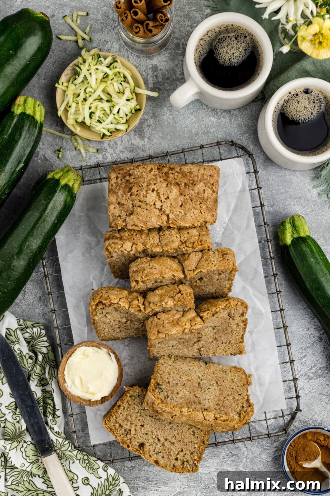 Squash Loaf 2 Overhead photo of a loaf of Zucchini Bread cut into slices, showcasing its moist texture.