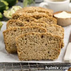 Close up photo of slices of Zucchini Bread, highlighting its moist interior.