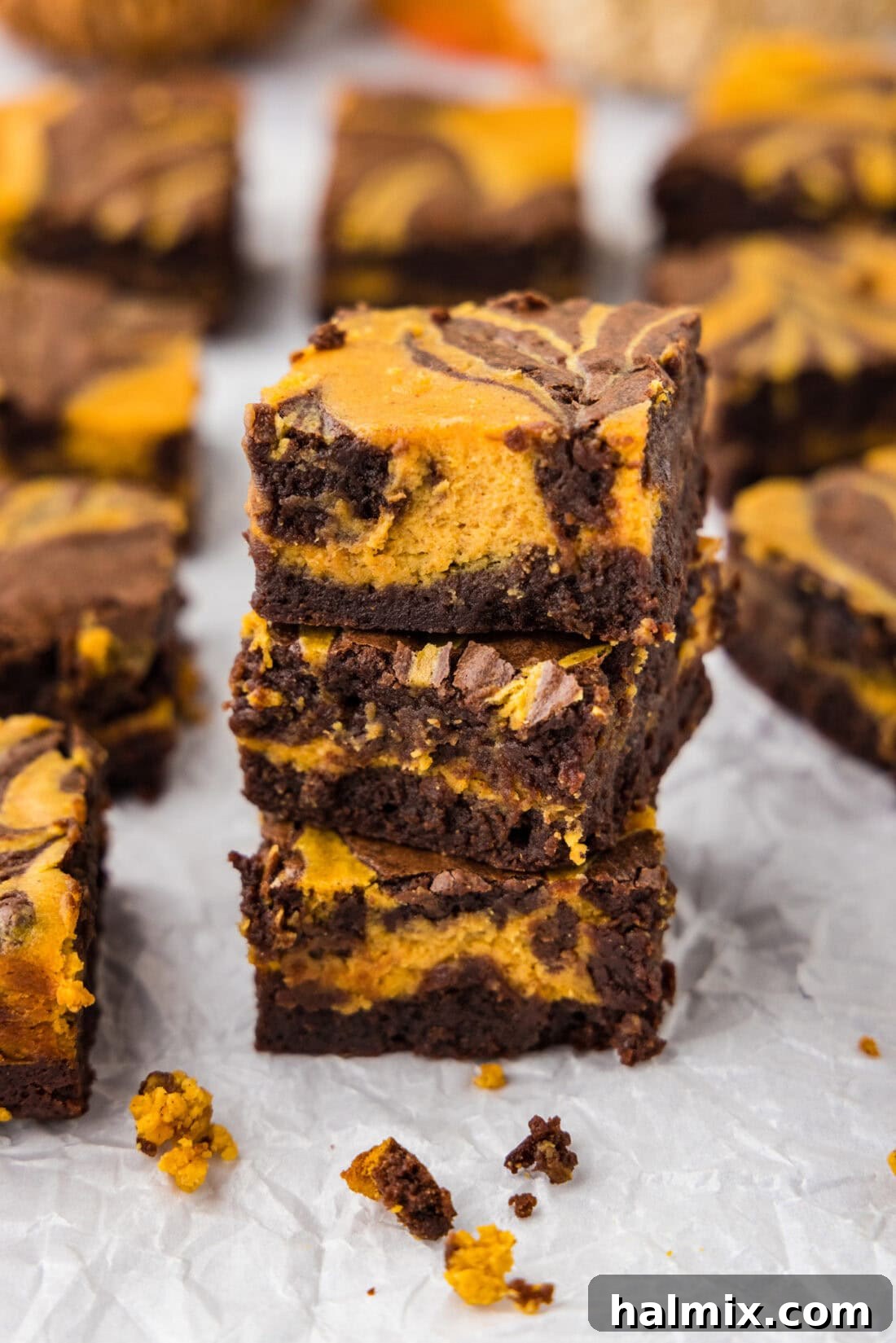 Spiced Pumpkin Swirl Brownies 2 Stack of three Pumpkin Cheesecake Brownies