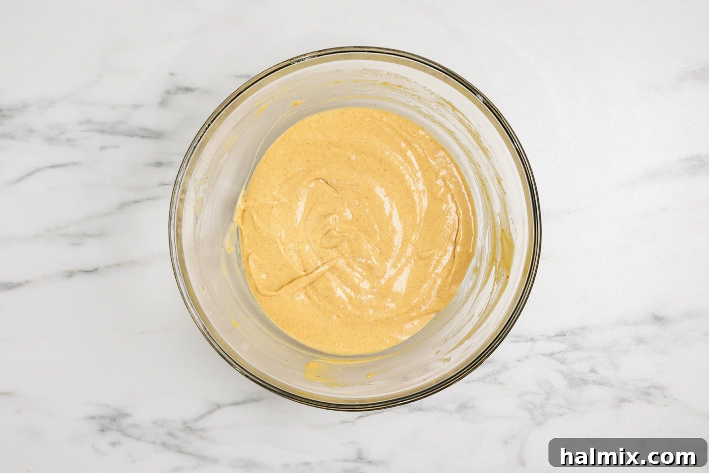 Spiced Pumpkin Swirl Brownies 5 pumpkin cheesecake batter in a mixing bowl