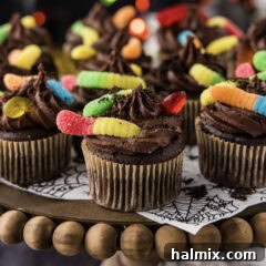 Close up photo of Halloween Dirt Cupcakes on a platter ready to be served
