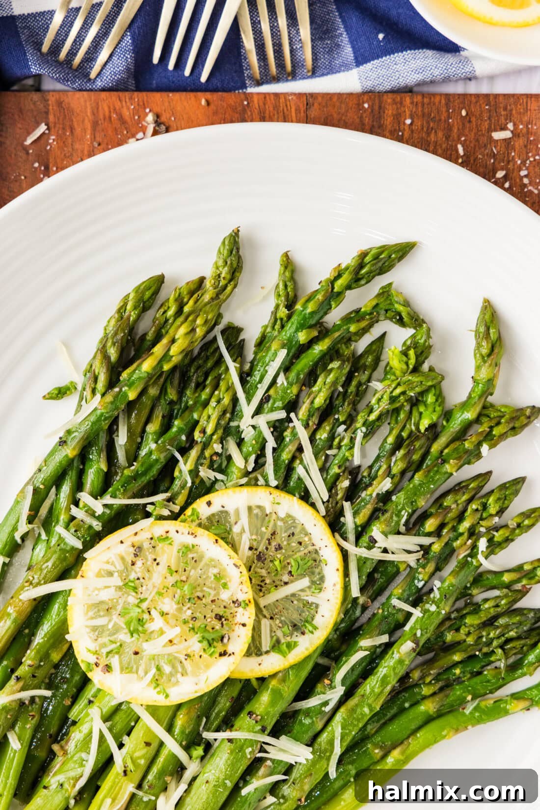 Perfect Instant Pot Asparagus 2 Close up photo of Instant Pot Asparagus topped with lemon slices