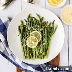 Perfect Instant Pot Asparagus 10 Plate of Instant Pot Asparagus with lemon slices