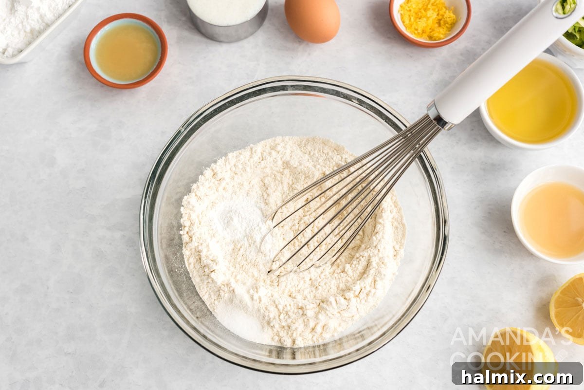 flour, baking powder, and salt whisked together in a bowl