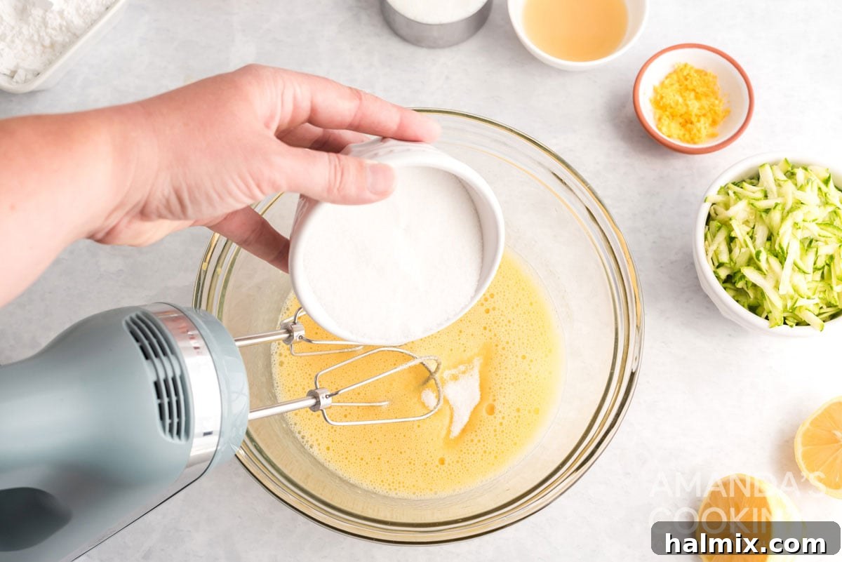 adding buttermilk to the bowl of wet ingredients for zucchini bread