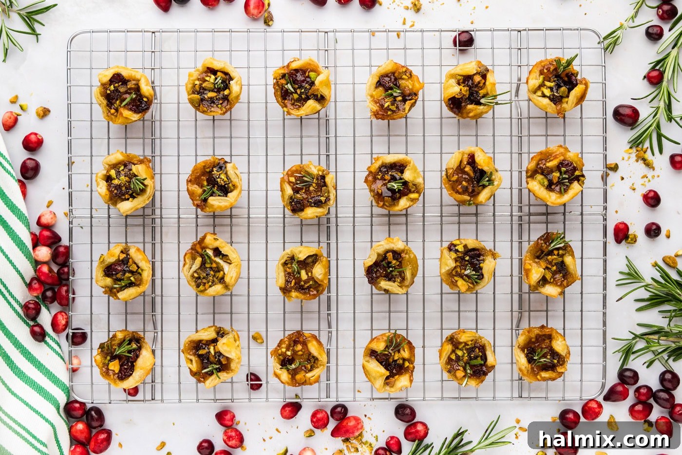 overhead photo of baked brie bites on a wire cooling rack