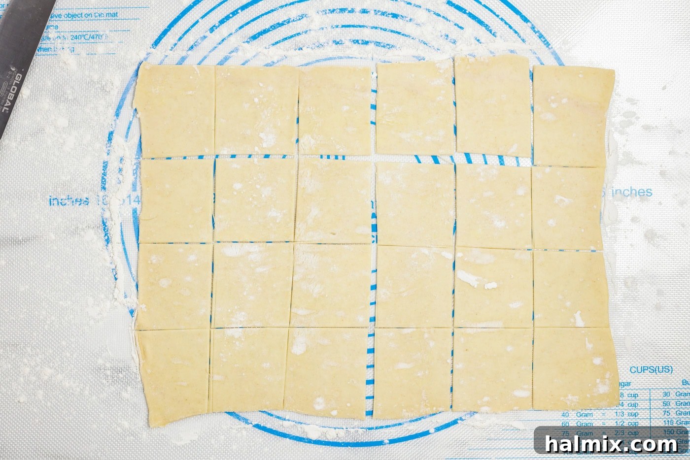 puff pastry sheet on a floured surface cut into squares