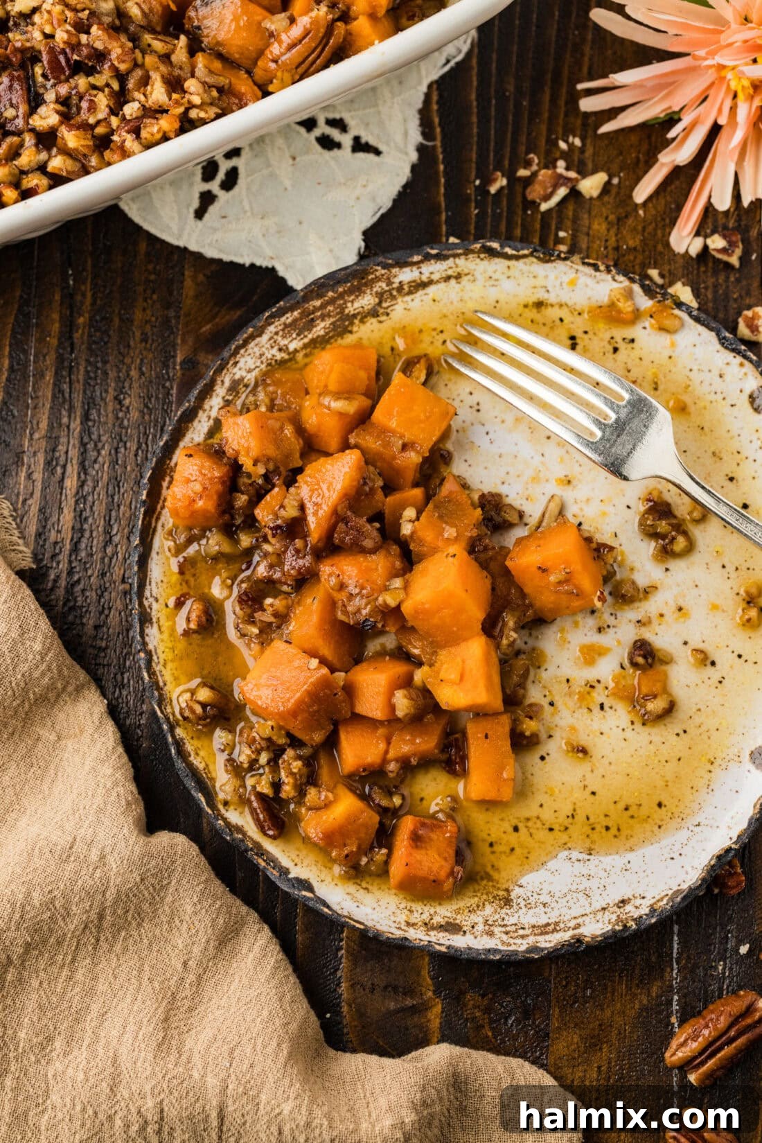 Bourbon Glazed Sweet Potatoes 3 Kentucky Bourbon Sweet Potatoes on a plate with a fork