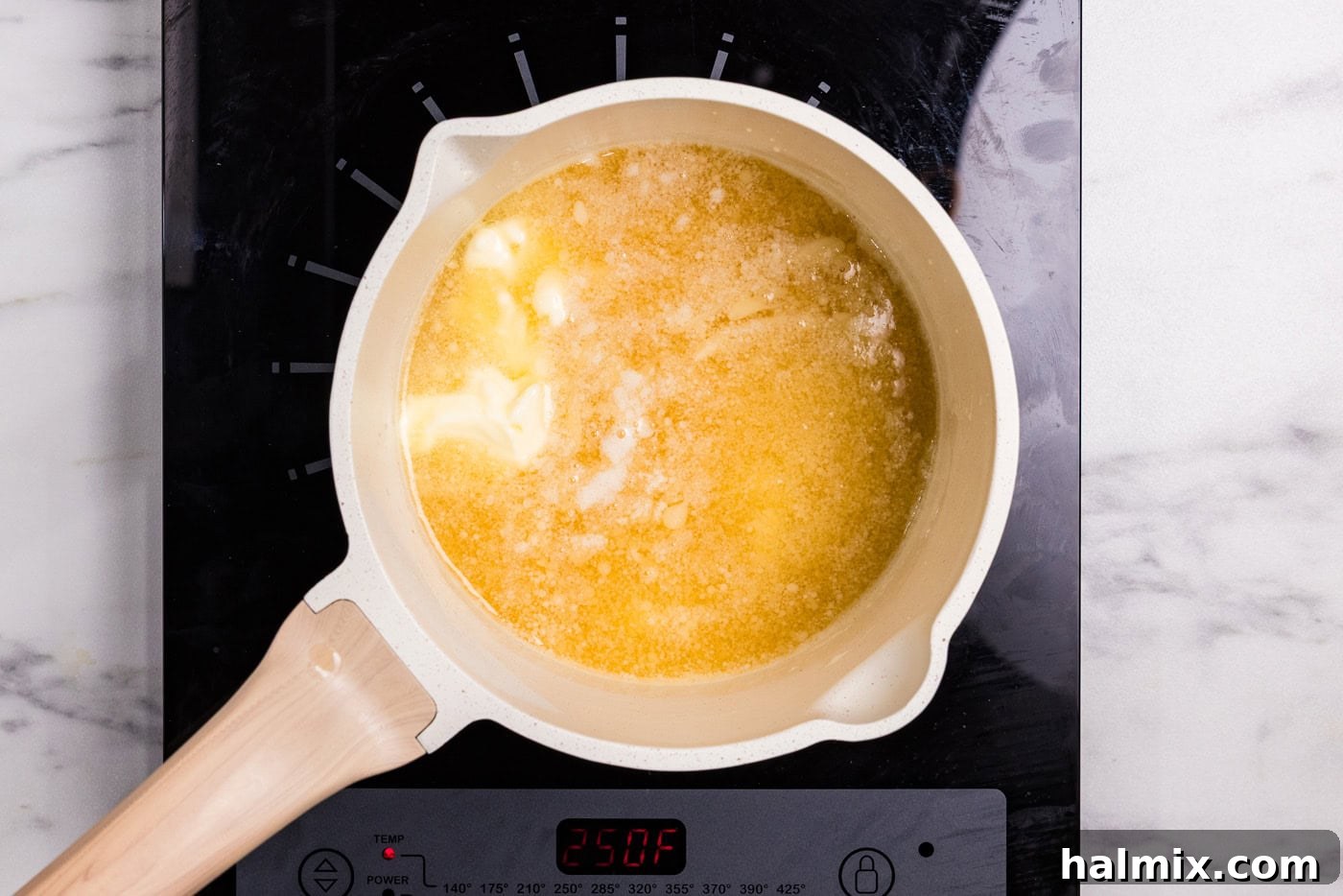 Bourbon Glazed Sweet Potatoes 7 melted butter with bourbon in a saucepan