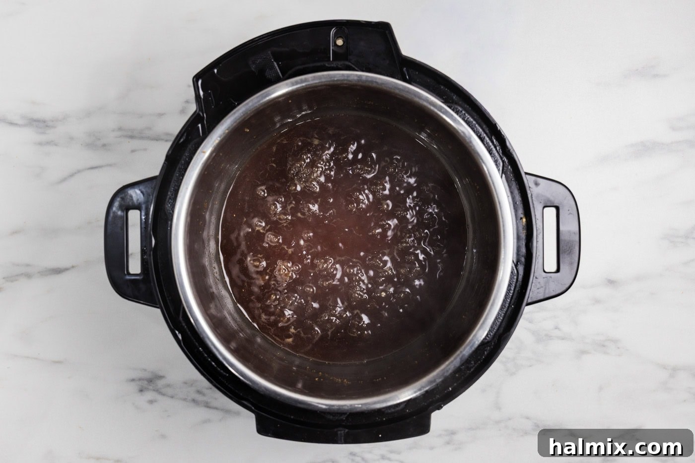 honey garlic sauce boiling in the instant pot