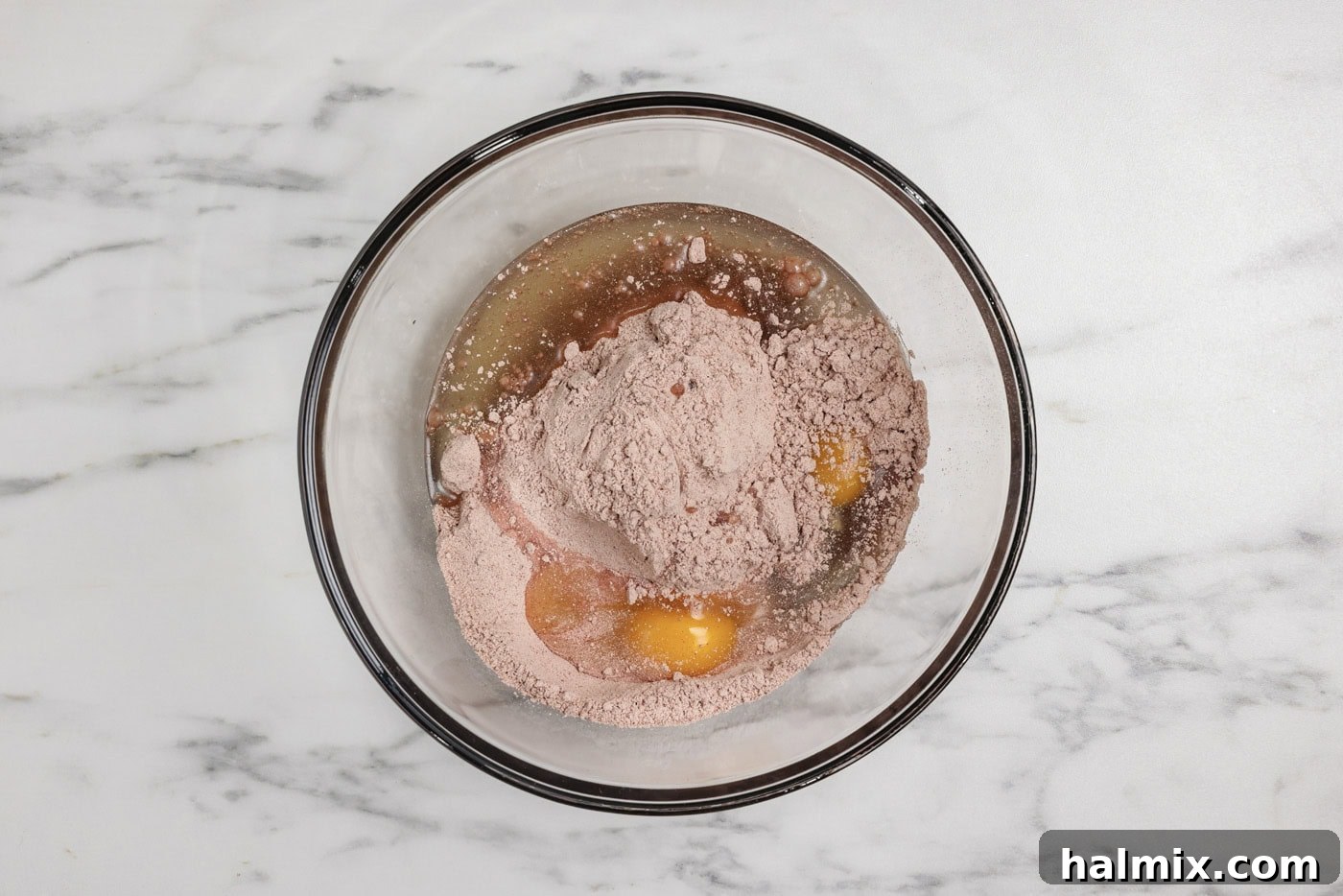 cake mix, oil, and eggs in a mixing bowl