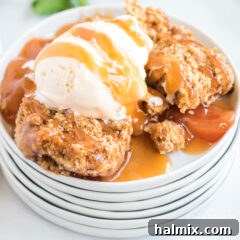 Cozy Crockpot Apple Cobbler 7 stack of dishes with apple cobbler