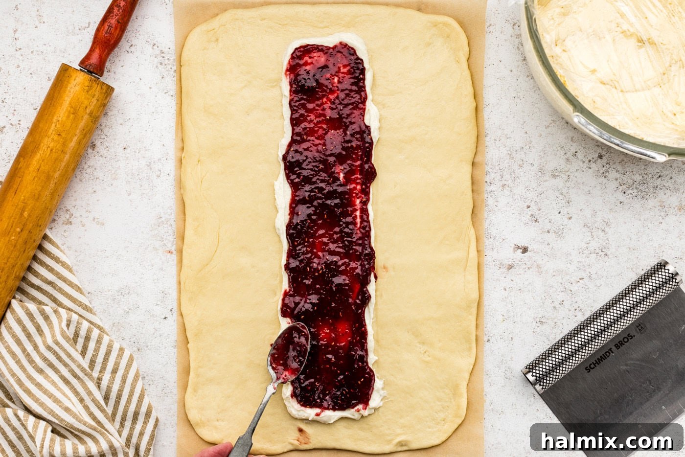 Sweet Braided Morning Pastry 11 adding preserves on top of cream cheese filling