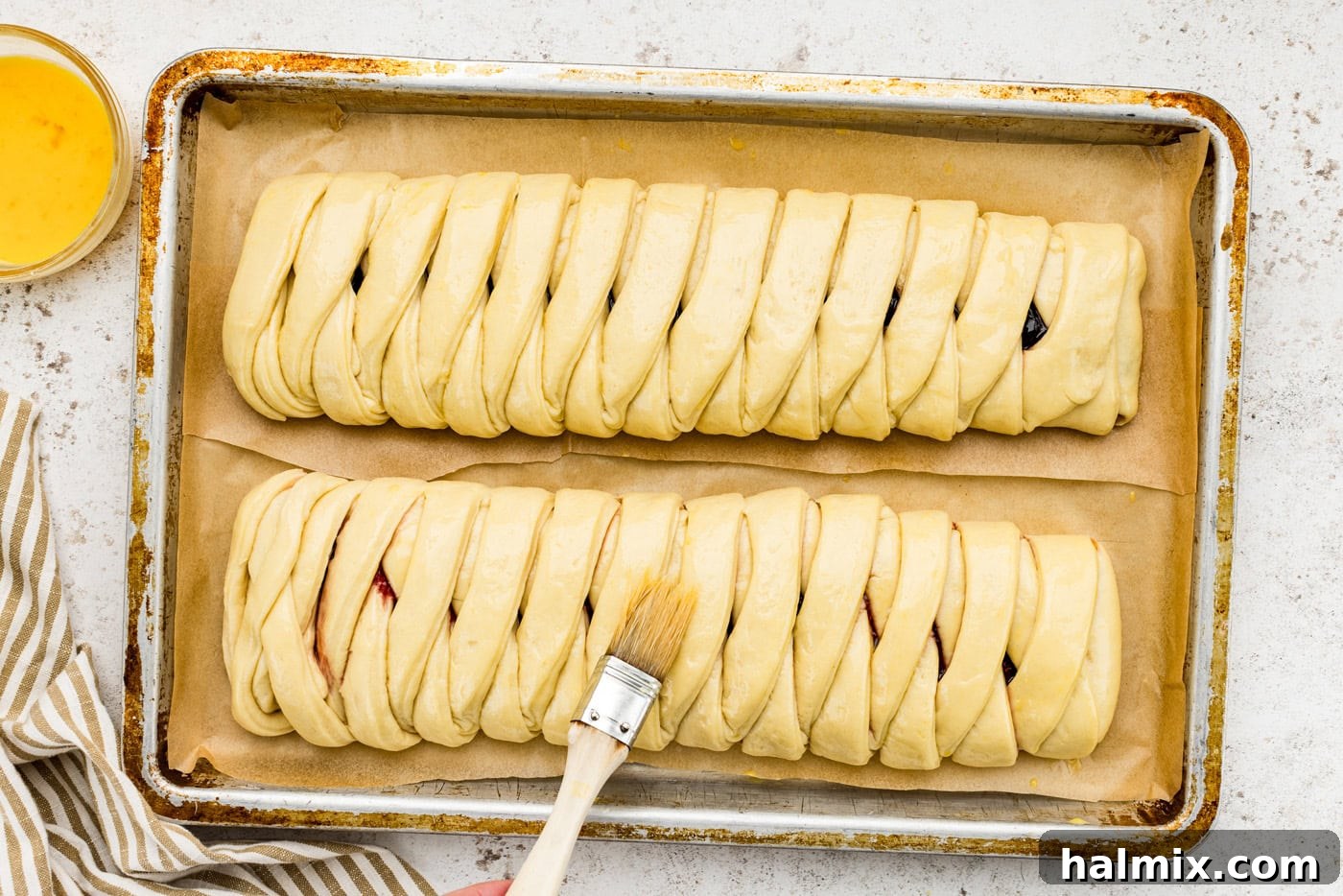 Sweet Braided Morning Pastry 17 brushing danish dough with egg wash
