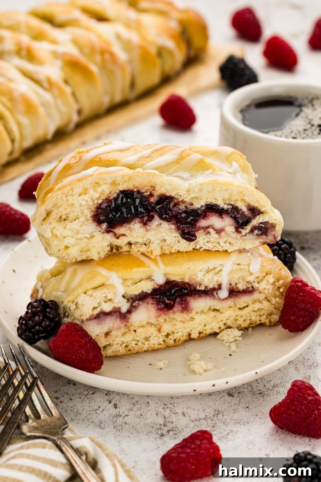 Sweet Braided Morning Pastry 3 Two slices of Braided Breakfast Danish stacked on a plate