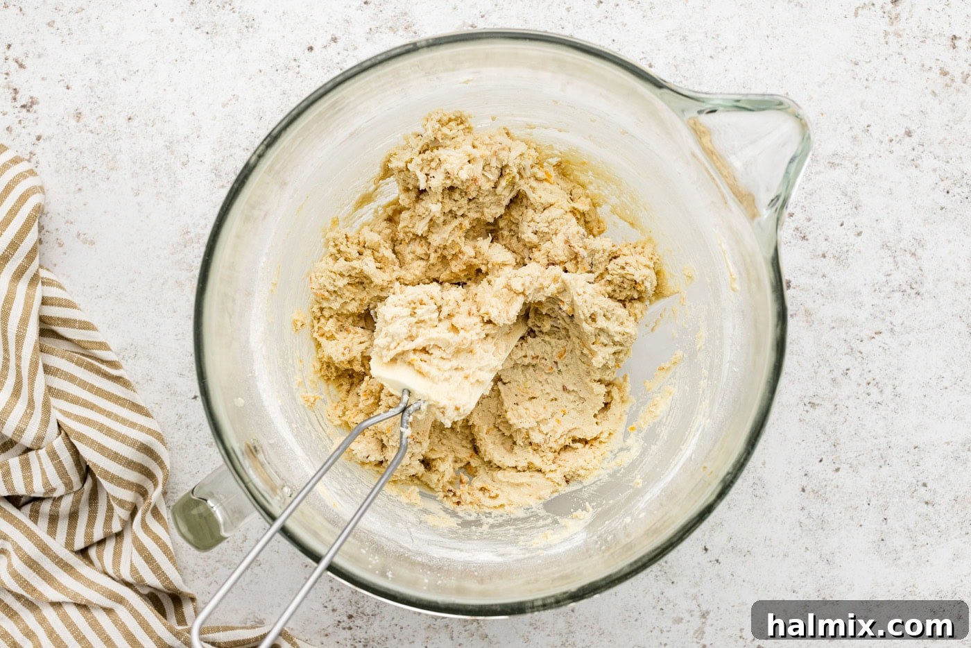 Icebox cookie dough in a stand mixer bowl, showing its soft and cohesive texture.