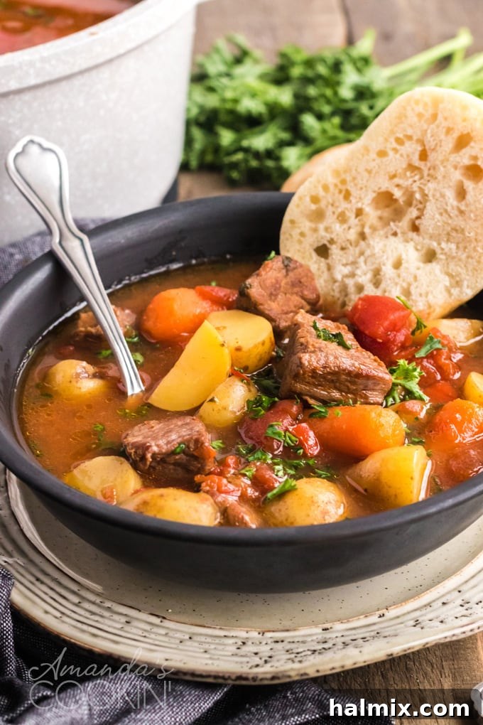 bowl of goulash with bread