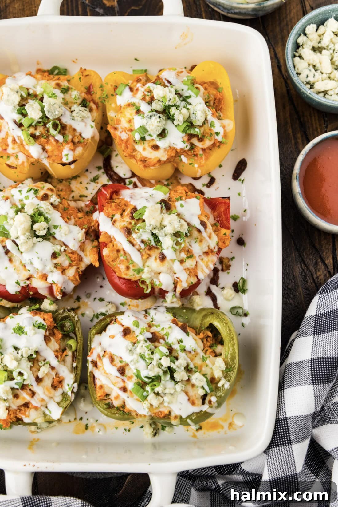 Zesty Buffalo Chicken Bell Pepper Bake 3 Close up photo of Buffalo Chicken Stuffed Peppers in a baking dish