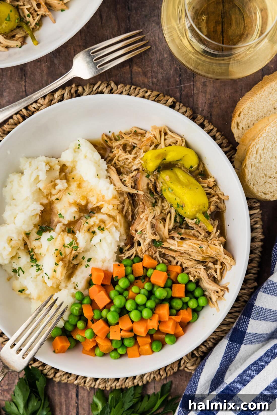 Bowl of Mississippi Chicken, mashed potatoes and veggies