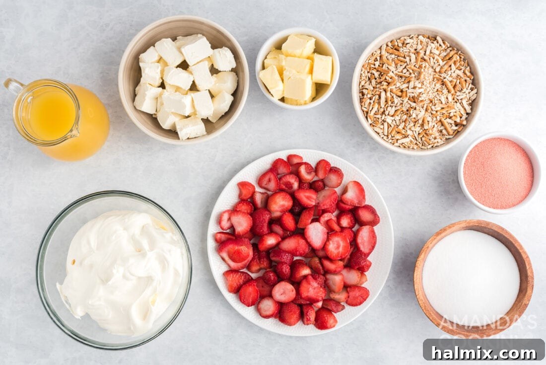 A display of all ingredients laid out for making Strawberry Pretzel Salad: pretzels, butter, sugar, cream cheese, whipped topping, strawberry jello, pineapple juice, and strawberries.