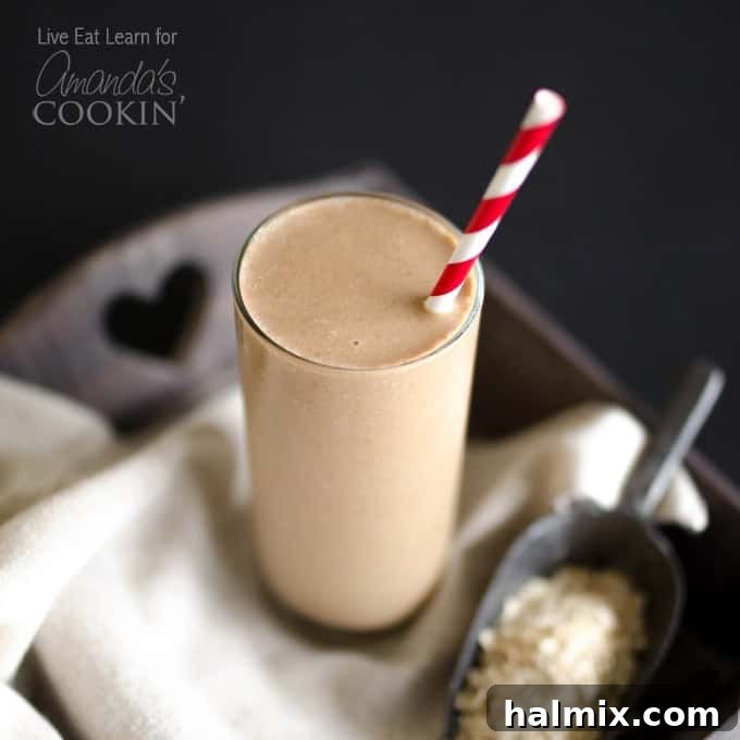 This Loaded Coffee Smoothie is packed with whole grains, fruit, protein, and (the best part) coffee! Everything you need to get out the door in 5 minutes! Loaded Coffee Smoothie served in a clear glass with ice