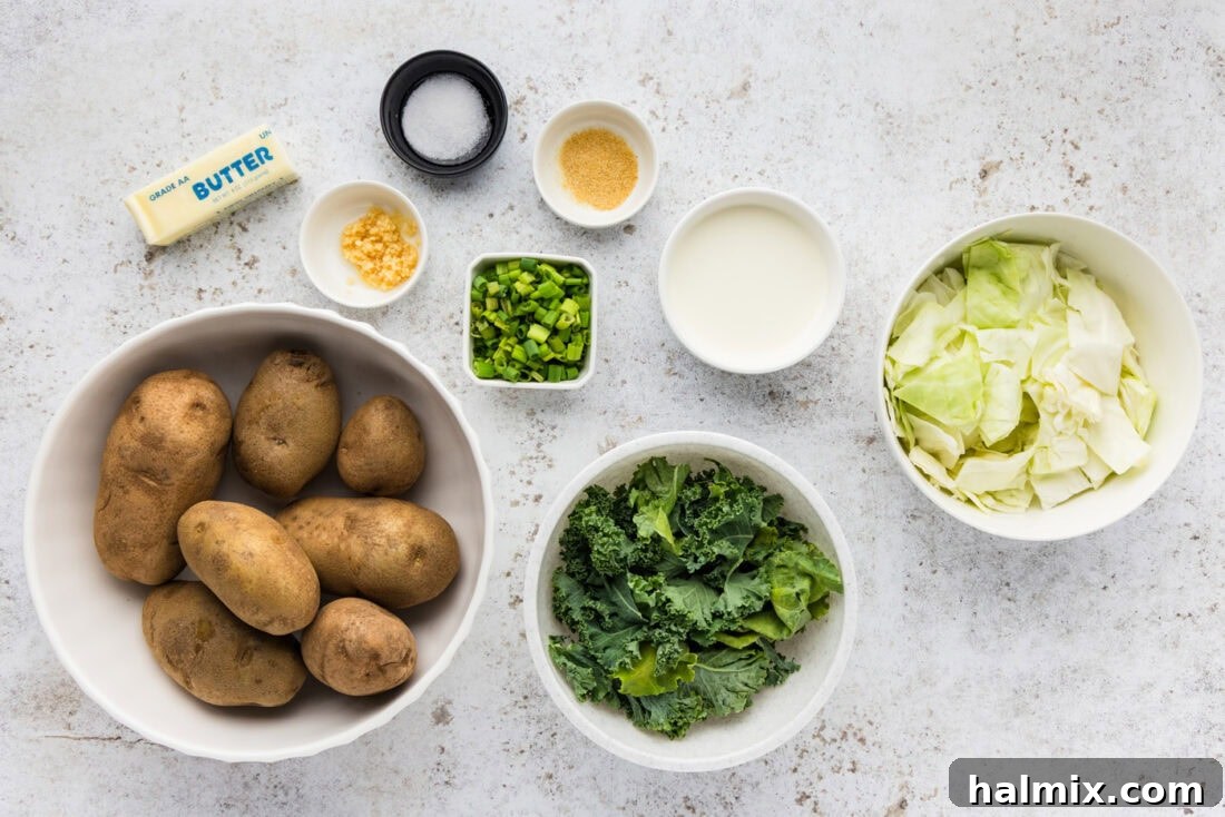 Colcannon: Ireland's Signature Mash 4 All the fresh ingredients laid out for making Colcannon (Irish Mashed Potatoes), including potatoes, cabbage, kale, butter, cream, and garlic.