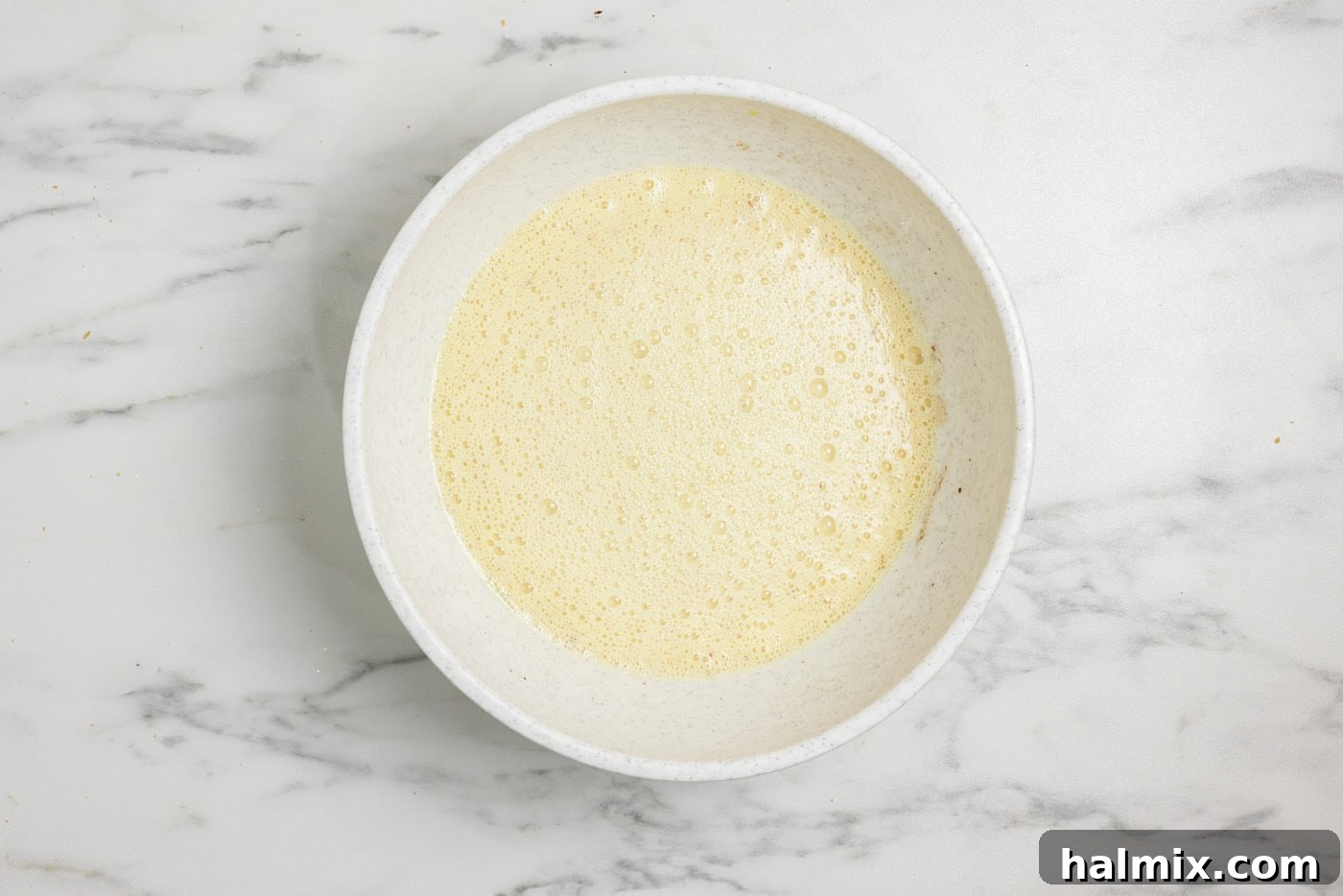 Custard filling in a bowl for french toast casserole